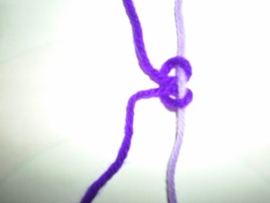 Loosening a square knot. 