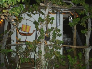 End of the arbour with rope-lights on 