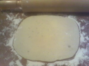 Roll each ball into a thin, roughly round circle