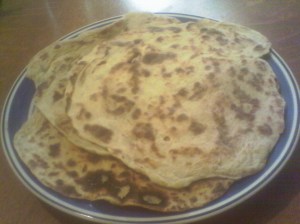 Plate of lefse, ready to roll
